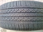 Продам 1 шину Bridgestone 265/60 R18 с infinity fx35 практически новая !