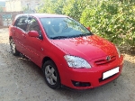 Toyota Corolla красный хетчбэк, 2005 г